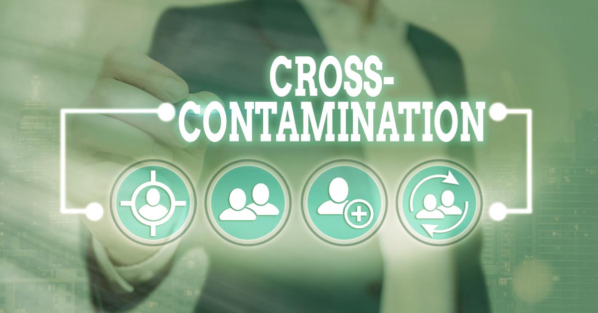 A man in a button-up shirt and a suit jacket is standing in the center of frame. There are words in front of him.